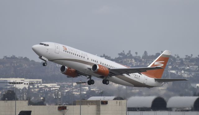 BOEING 737-400 (N802TJ) - Departing LAX on 25R