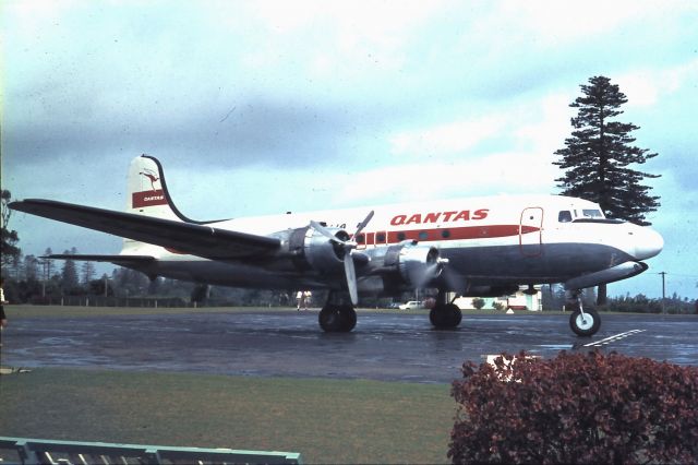 Douglas C-54 Skymaster (VH-EBN) - "Norfolk Trader" arriving to take us home from our honeymoon on NI.  A radar malfunction delayed departure for another day - and night.