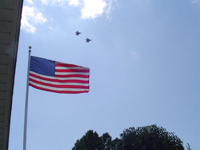 — — - Raptors turn final above my flag for Tyndall AFB Sep 07