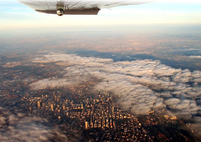 Cessna Centurion (ZS-AVB) - The city of Johannesburg, South Africa