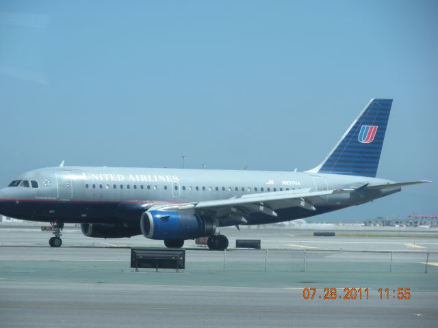 Airbus A319 (N837UA) - On a shuttle bus riding around the tarmac of SFO.