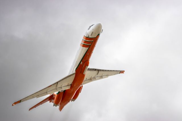 McDonnell Douglas MD-87 (N293EA) - Standing off the end of runway 24 at WJF