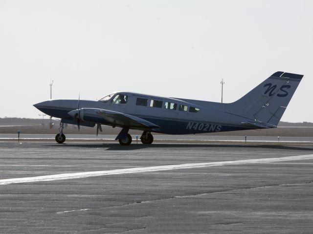 Cessna 402 (N402NS) - After landing runway 06. Rearward C0G.