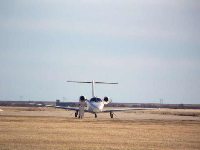 Cessna Citation CJ1 (N607TN) - Midwest Transplant Network Plane  from front parked at Hays, KS.  Photo was brightened with Photo shop.