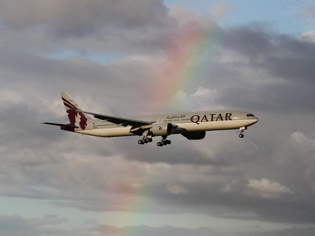 BOEING 777-300ER (A7-BAI) - Flying through the rainbow