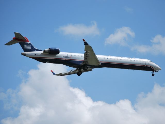 Canadair Regional Jet CRJ-900 (N908FJ) - Final for runway 23 - 3/25/13