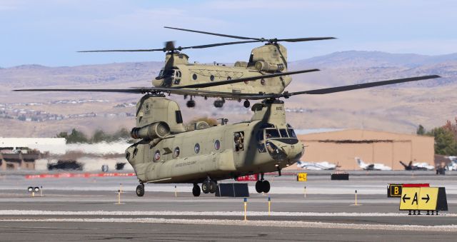 Boeing CH-47 Chinook (1208881) - A pair of US Army Reserve CH-47 Chinooks (Call: "Shake Eight Five" ) arrive at the Stellar Aviation West Ramp.br /Foreground: 12-08881      Background:  08-08771