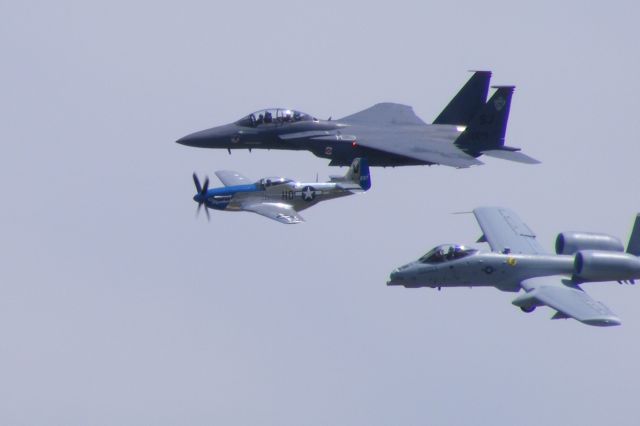 — — - Heritage Flight at Wings Over Whiteman includes a P-51 Mustang, A-10 Thunderbolt II, and an F-15E Strike Eagle.