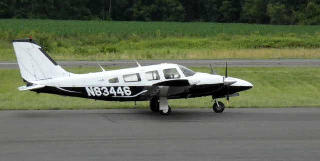 Piper Seneca (N83446) - Taxiing to departure is this 1981 Piper Seneca III PA-34-220T in the Summer of 2021.