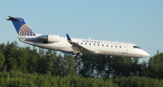 Canadair Regional Jet CRJ-200 (N492SW) - On final is this 1997 United Express Canadair Regional Jet 200LR from the Spring of 2021.