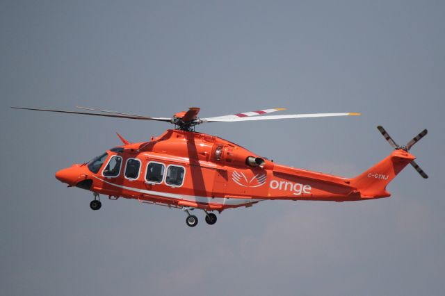 C-GYNJ — - An Ornge air ambulance flares for landing in Kingston. Ontario.. May 2012