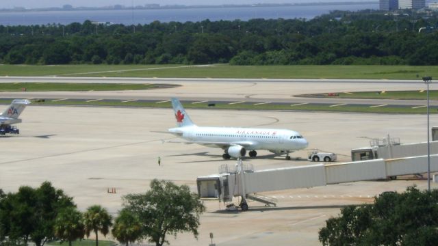 Airbus A321 (C-FDQV) - Pushing back from gate in Tampa