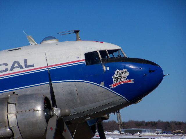 Douglas DC-3 (N982Z) - This beautiful DC3 was originally delivered in 1943 to the U.S. 9th Air Force. Now peacefully serving the needs of people afar, it is seen arriving at Oakland International Airport in Waterford, MI with a load of medical supplies for a Hati relief effort on a beautiful sunny day in March. March 5th 2010