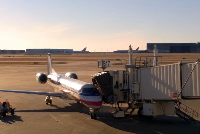 Embraer ERJ-145 — - The jetway is bigger than the aircraft!