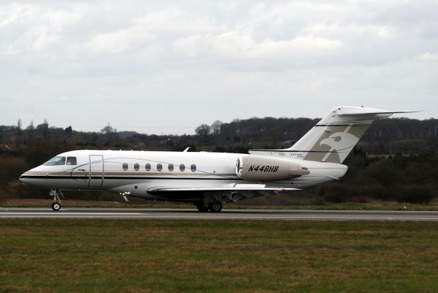 Hawker Beechcraft 4000 (N448HB) - Touching down on R26 on 11-Mar-11.