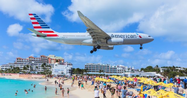 Airbus A330-200 (N290AY) - American Airlines over maho beach area on the island of St Maarten for landing!