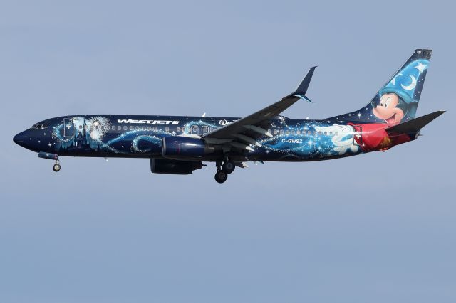 Boeing 737-800 (C-GWSZ) - Westjet's 'Disney Magic' special livery arriving from Calgary