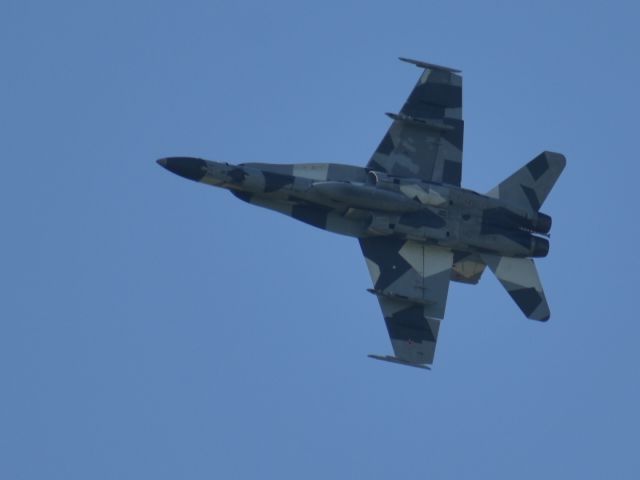 — — - F/A-18 Aggressor in the right overhead break