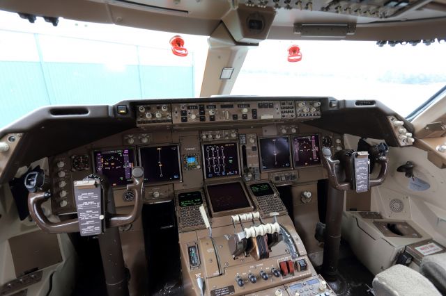 Boeing 747-400 (VH-OJA) - QANTAS, B744, City of Canberra, flight deck. Now retired and preserved at HARS. The red suction devices on the windshield are in place to hold the silver sun screen heat reflectors, not needed on an overcast day.