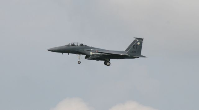 McDonnell Douglas F-15 Eagle — - F-15 Eagle. I was driving north out of Destin passing Eglin AFB where they had numerous jets performing touch & gos. I pulled over and took photos of this impromptu airshow.