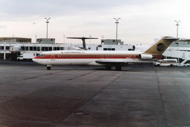 BOEING 727-200 (N88715) - Denver Stapleton Airport 1980-12-22. Waiting for our flight to SFO (United Airlines DC-8).