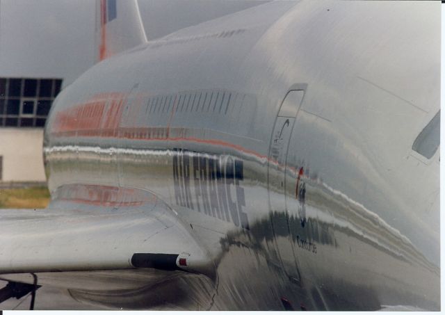 Aerospatiale Concorde (F-BVFA) - Nice reflection from a passing Northwest DC10