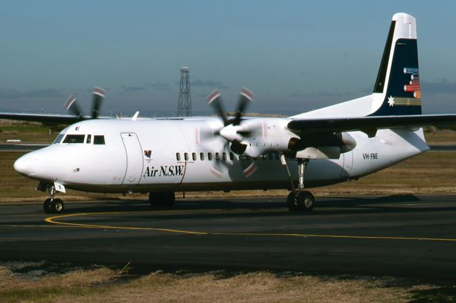 Cessna 310 (VH-FNE) - AIR NSW. - FOKKER F-50 - REG : VH-FNE (CN 20110) - KINGSFORD SMITH SYDNEY NSW. AUSTRALIA - YSSY 28/6/1988 35MM SLIDE SCANNED WITH A EPSON PERFECTION V700 FLATBED SCANNER.