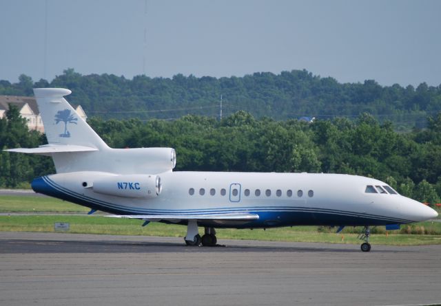 Dassault Falcon 900 (N7KC) - FALCON 200 INC (Kenny Chesney) at KJQF in town for a concert at Verizon Wireless Amphitheatre. - 6/2/11