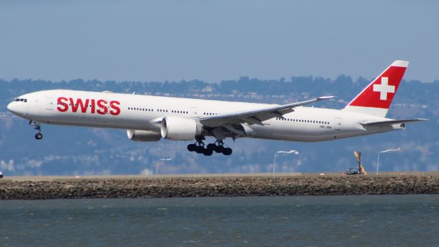 BOEING 777-300 (HB-JNK) - landing 28l at SFO