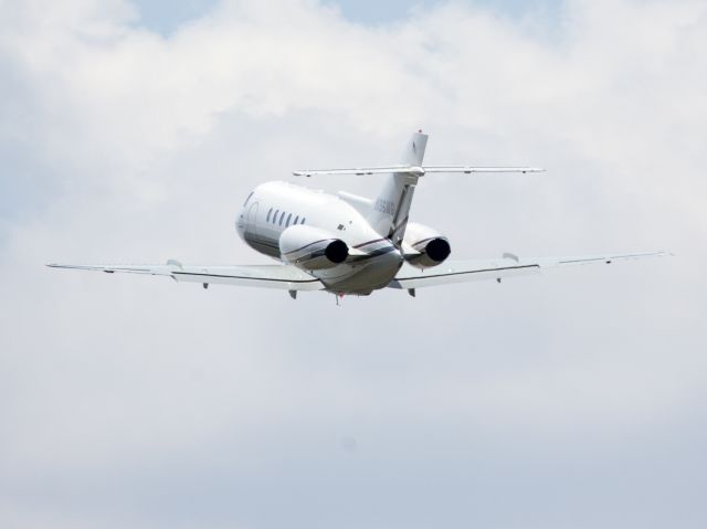 Hawker 800 (N196MG) - Powerful take off runway 26.