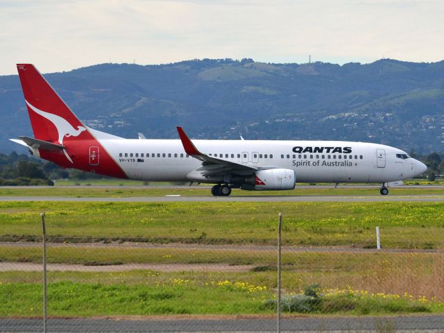 Boeing 737-800 (VH-VYB) - On taxi-way heading for take off on runway 05. Thursday, 12th July 2012.