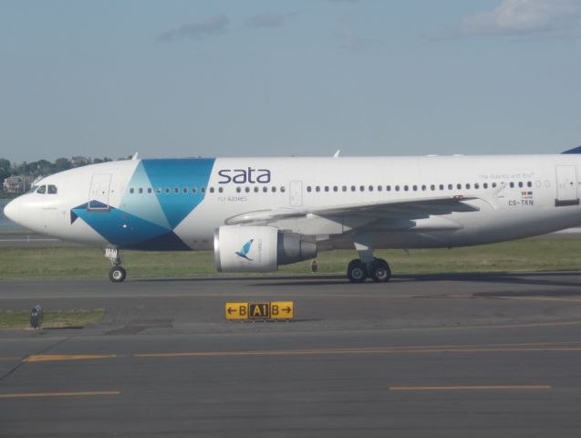 Airbus A310 (CS-TKN) - I was on Aer Lingus A330-300 that is ready for pushback, A310 taxing to gate. June 24th, 2015