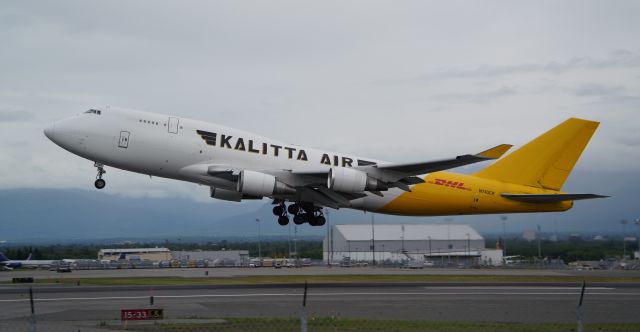 Boeing 747-400 (N743CK) - Kalitta Air, split DHL livery, 744 departing runway 33 in Anchorage, AK (PANC). 