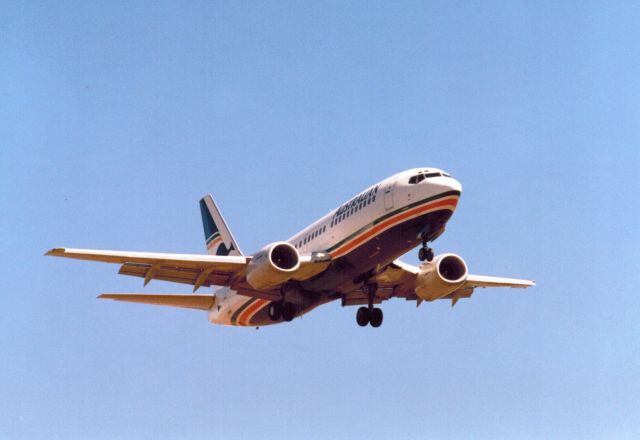 BOEING 737-300 (UNKNOWN) - Approaching from the south to the main runway at Melbourne Tullamarine, 1989.  Unable to confirm aircraft details as cant quite read the aircraft name on the side of the nose.  Australian Airlines is now part of Qantas but Flightaware doesnt have a code for the original airline. 