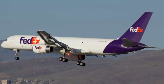 Boeing 757-200 (N930FD) - Completing her early evening (6:08 PM) approach to Reno Tahoe Internationals runway 34L, Fed Exs "Diana" (N930FD) begins to flare out.