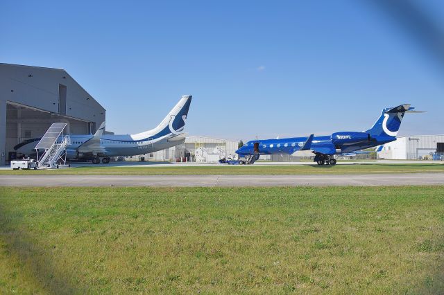 N931FL — - Bopper Airways - half of Indianapolis Colt's team owner Jim Irsay's corporate fleet. Shown here with his BBJ, N101TD. My first time to ever catch both in the same shot. Apologies for the chain link fence shadow. The other two are both G-450SP's, N106TD & N107TD.