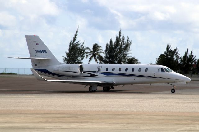 Cessna Citation Sovereign (HI1065) - Taxiing to depart rwy 10 on 30-Nov-21 heading for KMIA.