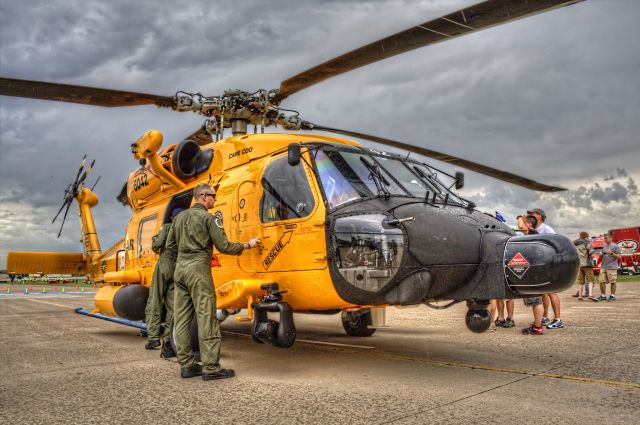 CG6042 — - A United States Coast Guard MH-60 at AirVenture 2016 in Oshkosh, Wisconsin. The aircraft is painted in a special scheme to commemorate the centennial of Coast Guard aviation.