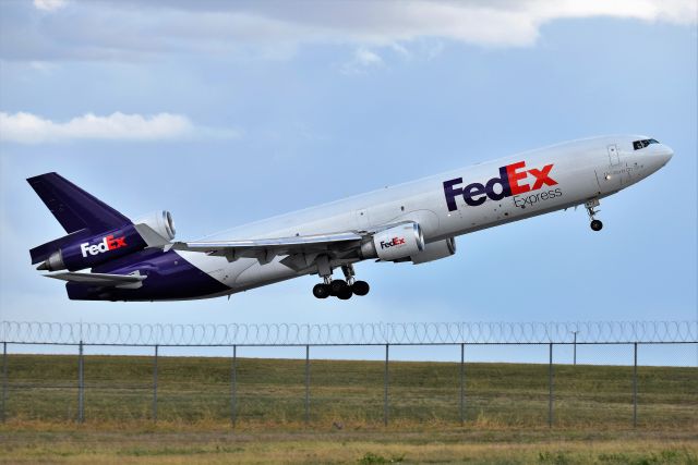 Boeing MD-11 (N573FE) - Departing 23-L on 10-01-20