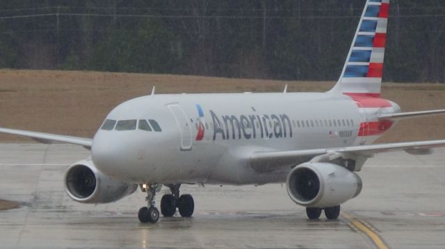 Airbus A319 (N808AW) - U.S Airways 1934 arriving from Charlotte at 3:10 P.M. on runway 5L.   Taken March 19, 2015.