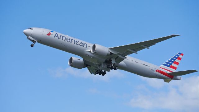 BOEING 777-300 (N729AN) - AAL9702 climbs from Rwy 16R to begin its delivery flight to KDFW on 5/19/14. (LN:1200 / cn 33127).