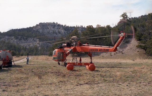 — — - Building a power line near Show Low.