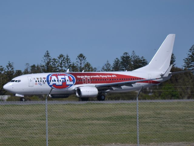 Boeing 737-800 (VH-VUY) - Rolling for a long take-off run on runway 05.