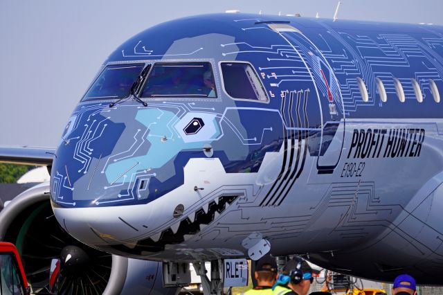 Embraer E190-E2 (2-RLET) - Embraer E190-E2 demonstrator (2-RLET) "Tech Shark" being pushed back into static display after flying at Farnborough Airshow 2022 (Tuesday 19th July 2022).