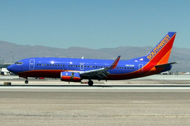 BOEING 737-300 (N633SW) - Touching down on rwy 25L on 10-Apr-14.