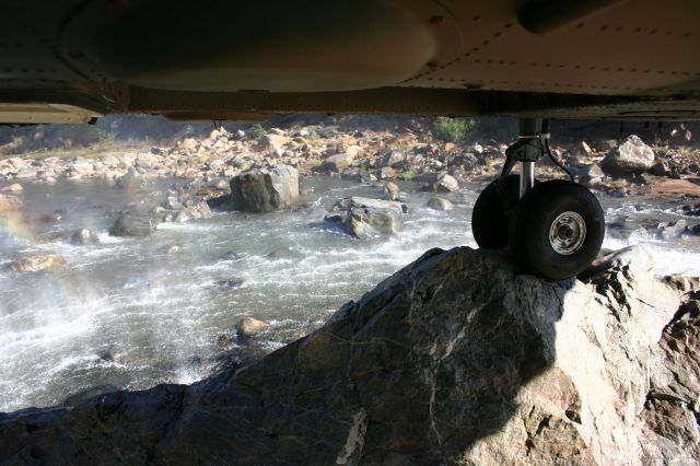 — — - Lying on my stomach, hanging upside down out the door, shot this one wheel landing of the SA Air force Oryx.