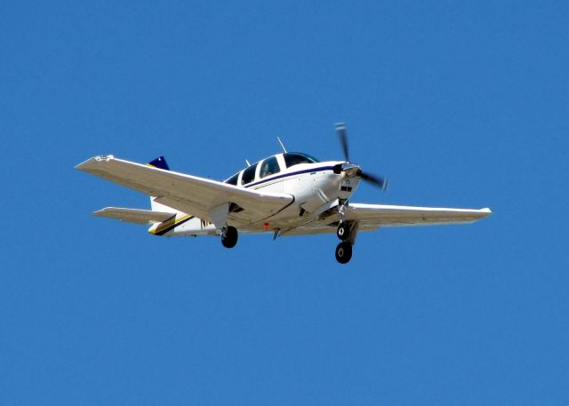 Beechcraft Bonanza (33) (N1559L) - Landing at Downtown Shreveport.