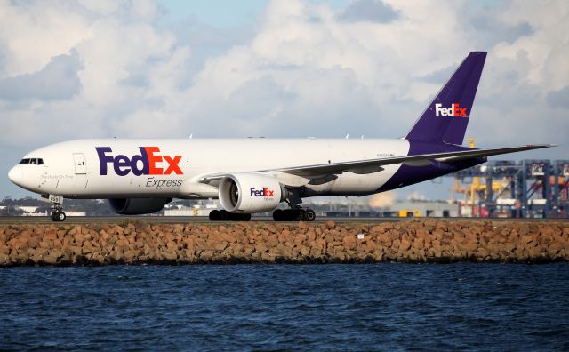 BOEING 777-200LR (N859FD) - Taxiing to the Freight Ramp