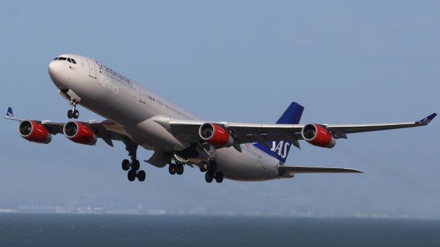 Airbus A340-300 (LN-RKG) - SAS A340-300 on the departure climb from SFO