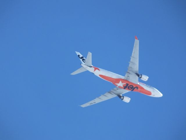 Airbus A330-200 (VH-EBC) - Flight JST216 on 06/11/2013 over central Auckland